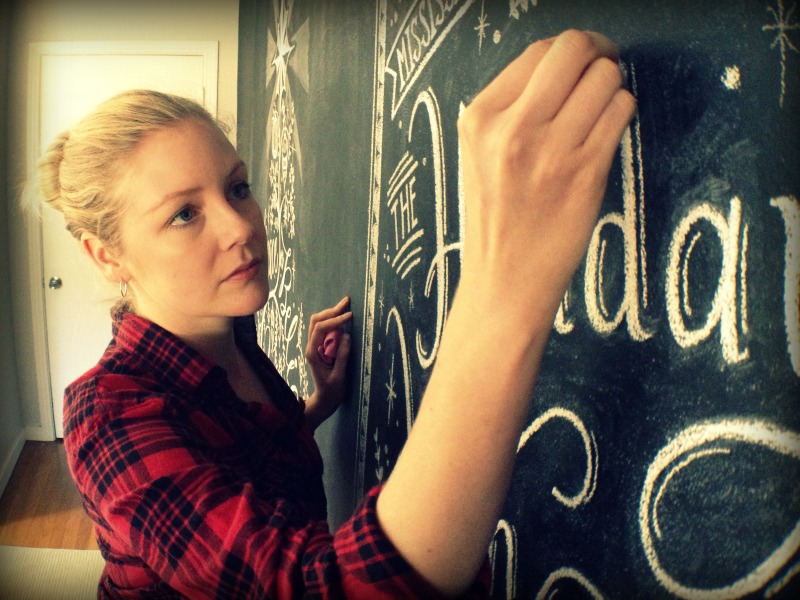 Chalk artist Bonnie Dickerson lives in Jackson with her husband, Doss Dingli, and their 100-pound Southern Black Mouth Cur, Clyde. When she's not working as editorial art director for Mississippi Magazine, Bonnie is creating masterpieces in chalk for business, friends, and communities. Photo by Shelley Powers